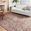 Cassandra Rust/Ivory Rug styled in living room with white sofa and wood floor