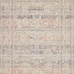 overhead view of entire rug highlighting rectangular bordered pattern with soft rust and gray colors