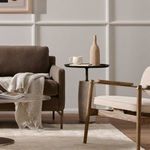 Close-up showing textured hammered iron finish with subtle matte color variations