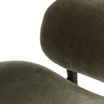 Close-up detail of chair’s backrest and seat fabric texture with visible stitching