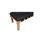 Close-up on corner of Costello Bench highlighting leather upholstery and oak frame joints