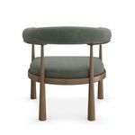 Back view revealing full curved bolster back and tapering wooden legs of the Bali Curved Club Chair