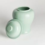 Ginger jar with lid removed displayed beside jar opening, highlighting inside and smooth gloss finish