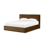 Quincy Bed angled view showing depth of padded headboard and velvety textured frame in Surrey Ochre