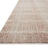 Low-angle side view highlighting flatweave texture and thickness of the rug