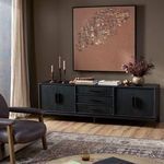 Rosenell Media Console styled in living room setting with artwork, decor, and seating