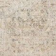 Theia Multi Natural rug with a distressed vintage pattern in neutral tones and subtle pops of color, featuring a soft pile...