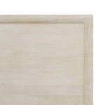 Close-up of smooth, framed edge detail on light mango wood headboard