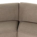 Close-up showing deep seating corner where sofa backrests meet at an angle.