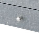 Close-up of single drawer pull featuring metallic knob with a subtle pearly finish