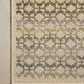 Detailed close-up of corner and mosaic pattern showing fine weave and stitching