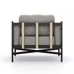 Rear view of Hearst Outdoor Chair with three vertical ivory straps over cushions