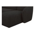 Close-up of chaise seat and rounded armrest detailing in boucle fabric