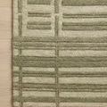 Close crop of Bradley Sage Olive Rug corner highlighting the tight weave and defined linear pattern