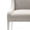 Close-up of chair seat edge and armrest showing fabric texture and gray mist steel frame