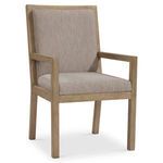 Prado arm chair in darker wood tone with taupe upholstery in angled front view