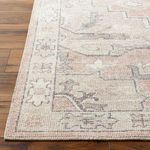 Side view focusing on the rug’s finished corner and border texture.