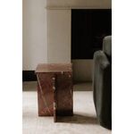Blair Accent Table positioned beside a sofa in a living room setting with neutral carpet and fireplace