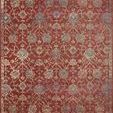 Giada rug with red background featuring classic floral motifs in muted blue, beige, and gold tones