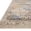 Low angle side view showing the rug’s thickness and fringed edges