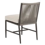 Rear view of Pietra Armless Dining Chair showing shale-colored rope back and graphite aluminum frame
