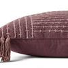 Side profile showing pillow thickness and solid mauve back with tassels visible
