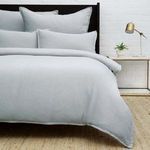 Light gray Waverly Duvet Set with wavy pebbled texture, ½” flange, shell button duvet closure, and envelope shams