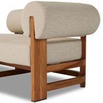 Close-up showing fabric texture on cylindrical backrest cushion