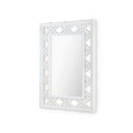 Clara Mirror angled view highlighting the depth and sculptural lattice frame
