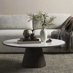 Top-down perspective highlighting table edge profile and smooth marble finish