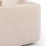 Close-up of armrest with soft rounded edge and subtle fabric texture
