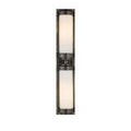 Bowland Bath Wall Sconce front view lit, showing symmetrical glowing opaque glass tubes