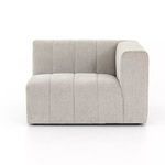 Front view of Langham channeled sectional showing wide vertical channels and right arm facing