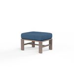 Laguna Ottoman with square driftwood-look aluminum frame and thick blue outdoor cushion