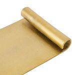 Close-up detail showing textured raw brass finish and rolled edge design of the tray