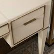 Close-up of right drawer front on Hunter Desk highlighting brass handle and ivory leather texture