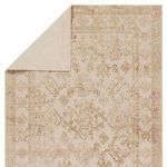 Repeated close-up corner profile showing detailed weave and clean edge binding of the gold and ivory indoor/outdoor rug