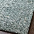 Detailed close-up highlighting the intricate layered pattern and soft pile of the Yeshaia Lagoon / Mist Rug