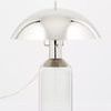 Large table lamp side view showing power cord and smooth glass base from right angle