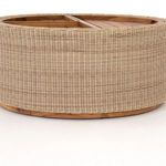 Front view showing natural rattan weave and wooden base trim
