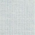Detailed fabric texture of greenlight upholstery with blue and white woven pattern