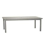 Side angle view of the rectangular aluminum dining table highlighting leg design and table thickness