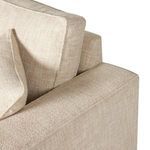 Diagonal close-up of Peyton Sofa arm and overlapping back cushions showing fabric detail