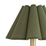 Close-up of green scalloped fabric shade showing texture and layered folds