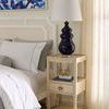 Maila Lamp on a cream vintage-style bedside table with decorative drawer and lower shelf