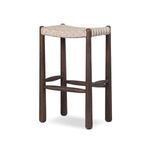 Three-quarter view highlighting woven seat edges and angled frame of outdoor bar stool