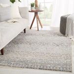 Cashel Tribal rug styled in bright living room beneath sofa and wooden side table