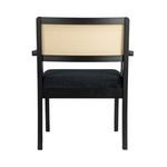 Rear view of Bramblewood Arm Chair emphasizing cane back panel and straight rear legs.