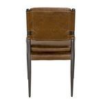 Rear view showing leather backing secured with straps to industrial steel frame