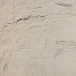 Close-up focused on upper left section with dark scribbles and softer shading on textured canvas